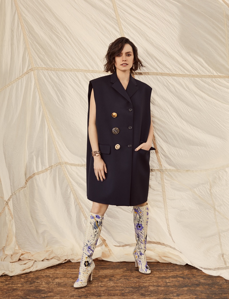 Actress Daisy Ridley poses in Miu Miu jacket and boots