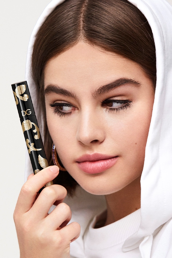 Model Lily Jean Harvey poses with Dolce & Gabbana Passioneyes Intense Volume Mascara