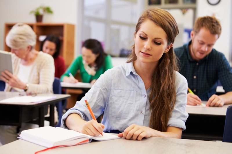 Female Student Writing Notes