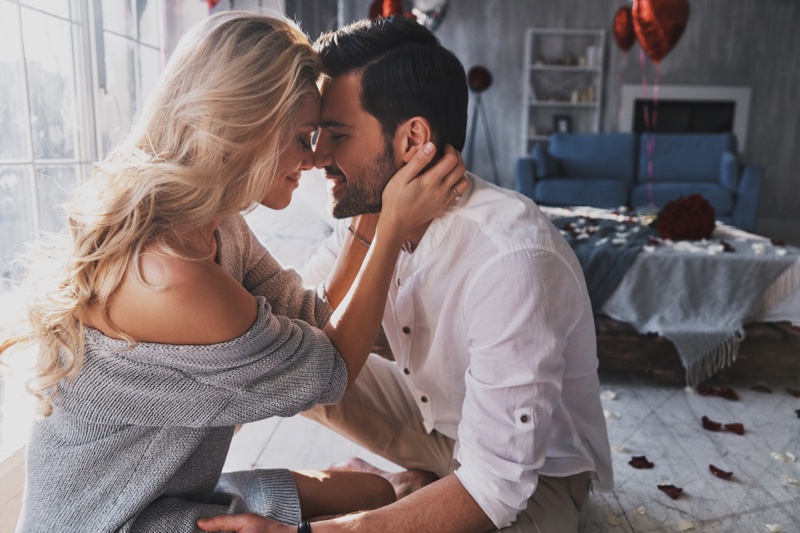 Happy Couple Embrace Blonde Woman Dark Haired Man