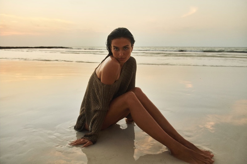 Model Andreea Diaconu poses at the beach for Massimo Dutti spring-summer 2020 campaign