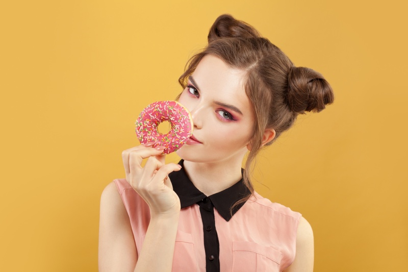 Model Beauty Pink Donut Bun Hairstyle