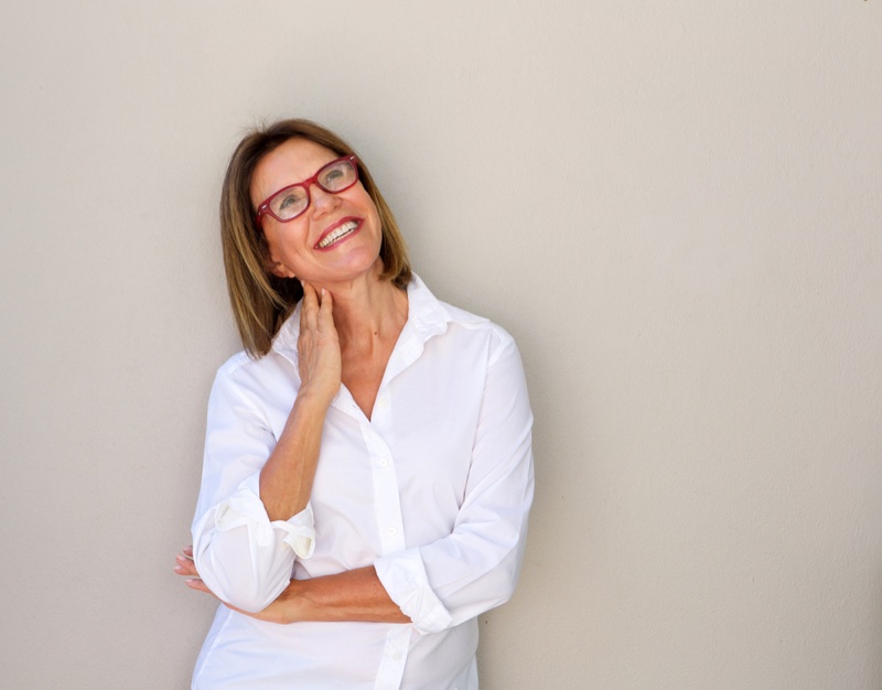 Smiling Older Woman Red Glasses White Shirt