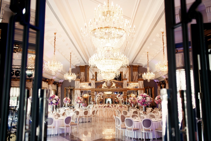 Wedding Venue Chandeliers Chairs Tables Wide Shot