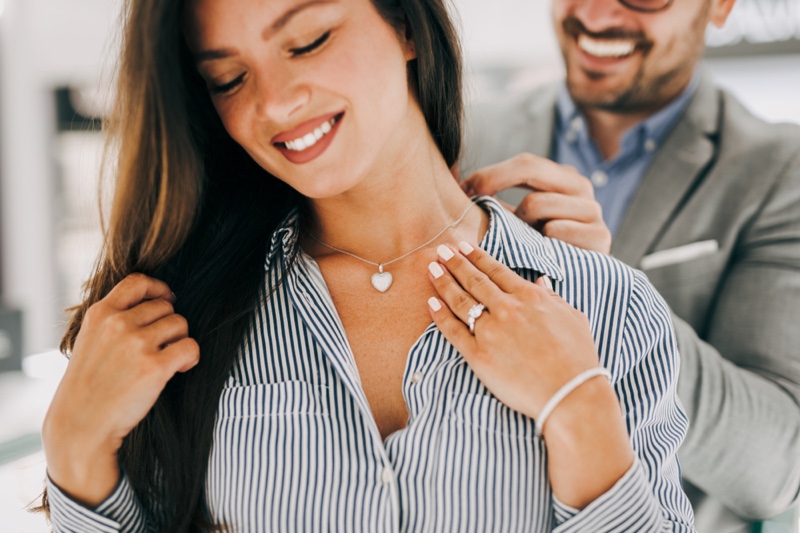 Woman Smiling Heart Shaped Necklace Man