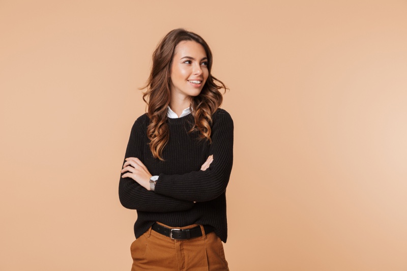 Attractive Woman Arms Crossed Black Sweater Smile