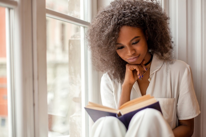 Black Afro Woman Reading Book Window