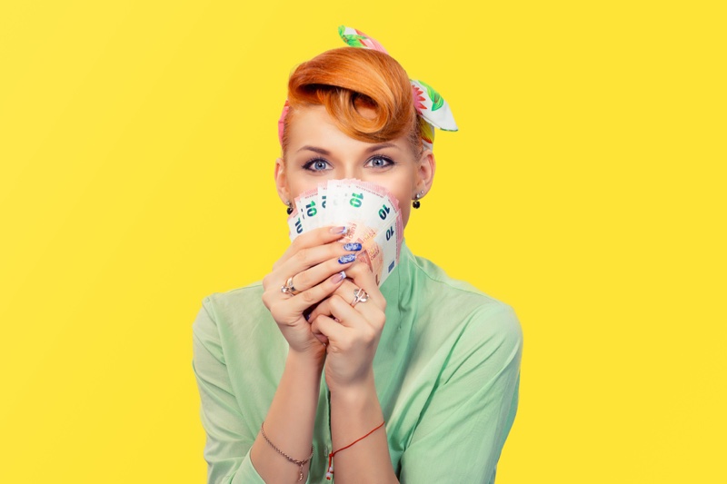 Excited Redhead Woman Money Retro Inspired