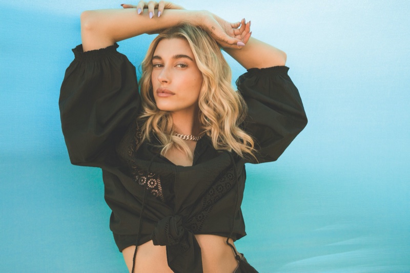 Dressed in black, Hailey Baldwin poses for Levi's Festival 2020 campaign.