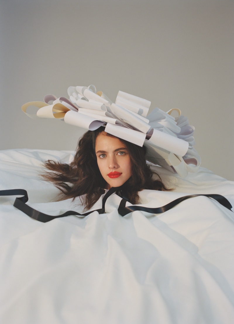 Actress Margaret Qualley tries on whimsical hat and gown. Photo: Daria Kobayashi Ritch for Hunger Magazine