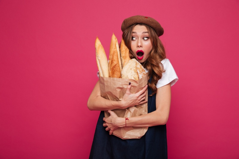 Model Holding Baguette Bread Bag