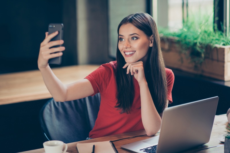 Smiling Brunette Woman Phone Laptop Influencer