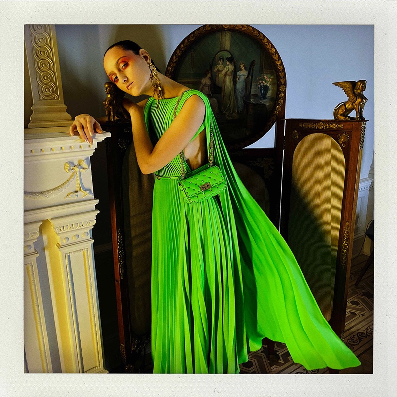 Model Jess Maybury poses in Valentino Fluo spring-summer 2020 campaign