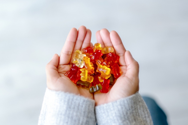 Woman Holding Gummies