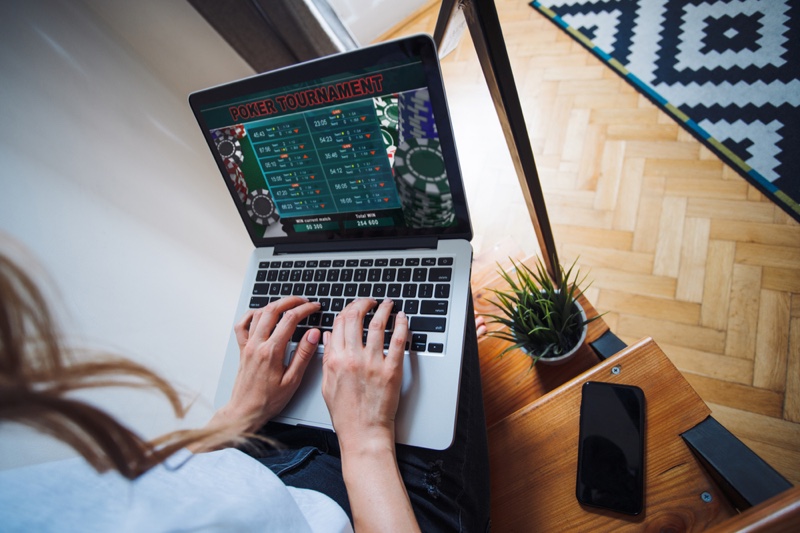 Woman Playing Online Poker Tournament