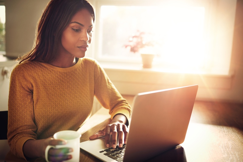 Black Woman Laptop Yellow Sweater