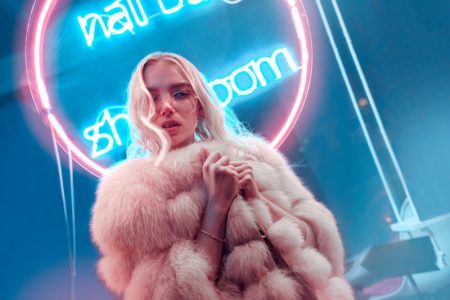 Your Go-To Guide On What to Wear for Your Next Night Out Blonde Faux Fur Jacket Neon Sign