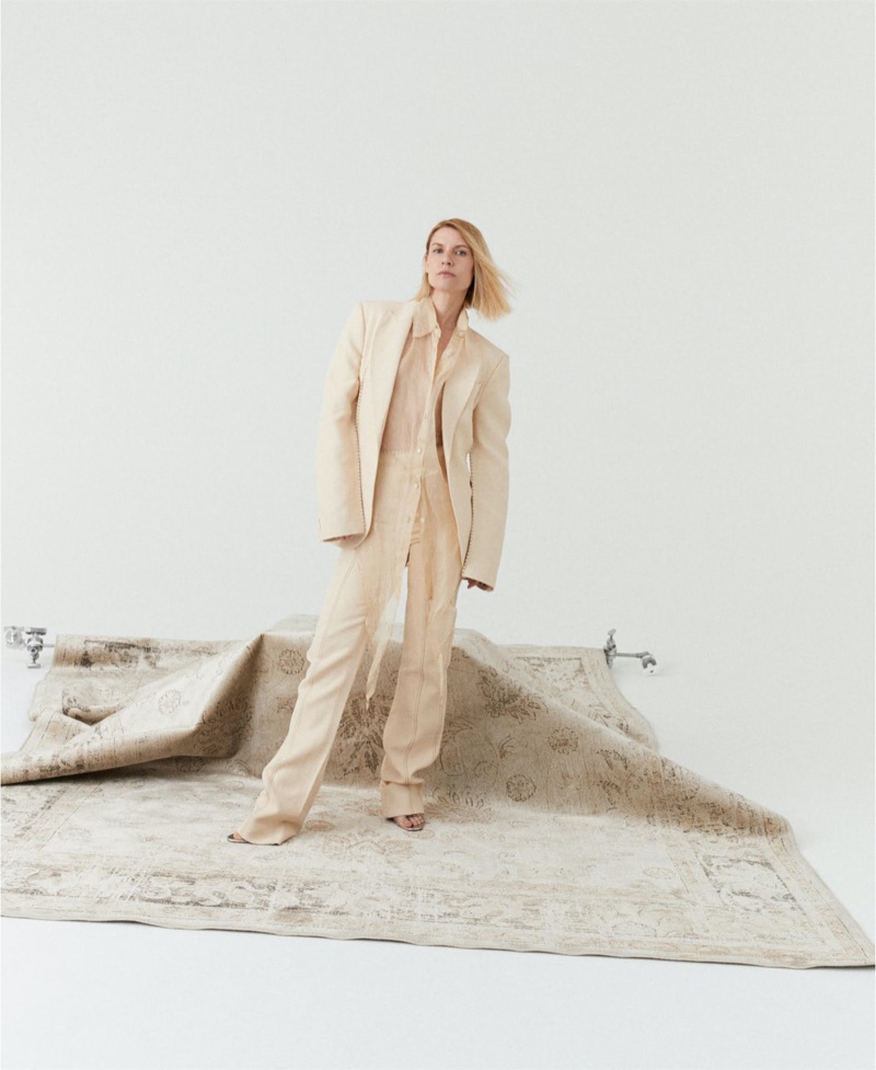 Suiting up, Claire Danes poses in Acne Studios blazer, shirt and trousers with Christian Louboutin heels.