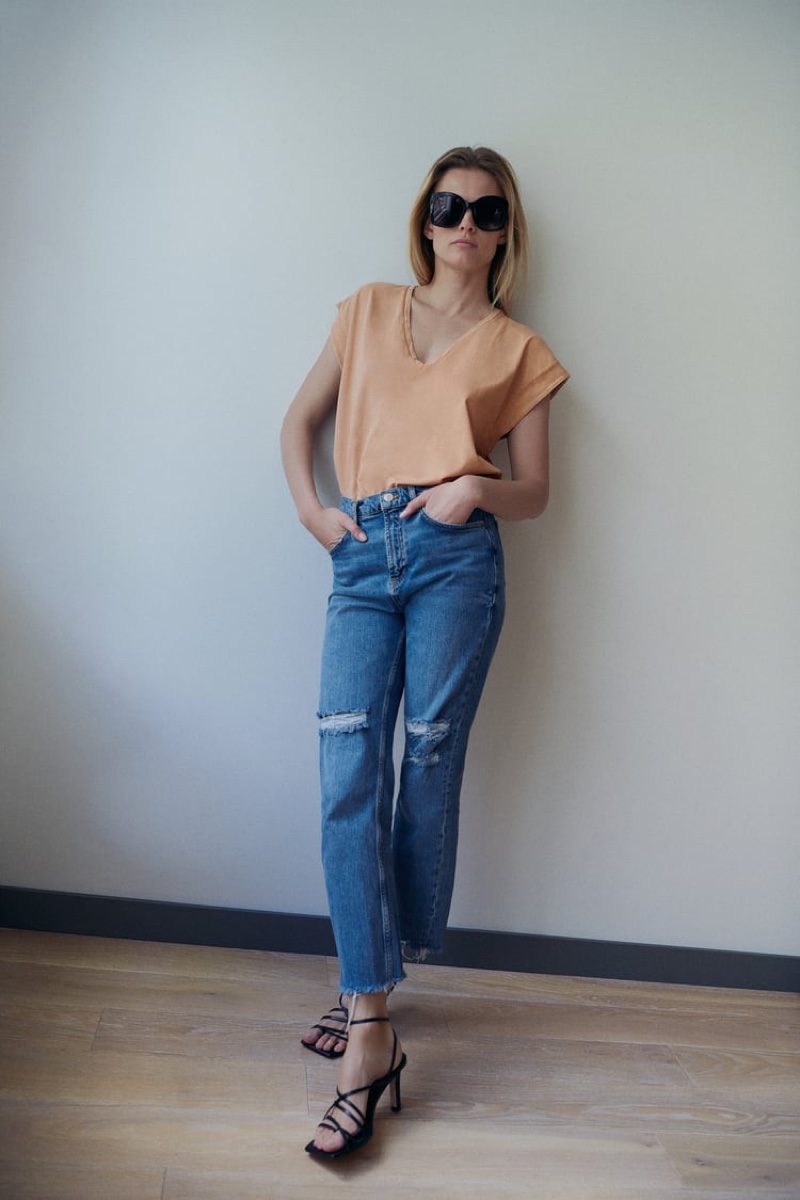 Keeping it casual, Edita Vilkeviciute models Zara's new arrivals.