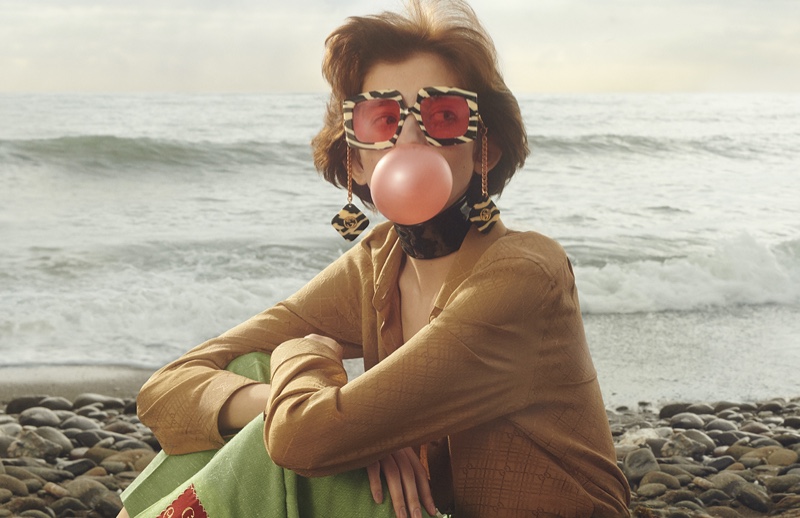 A model poses with bubblegum in Gucci's limited edition eyewear campaign.