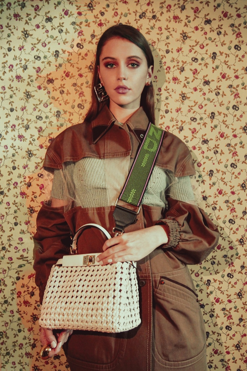 Iris Law shows off Fendi Peekaboo bag in interlocking leather.