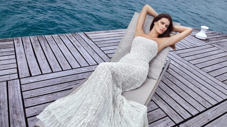Shimmering in silver, Isabeli Fontana poses for Ali Younes Couture.