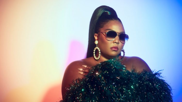 Lizzo poses in Quay Australia Hold Please sunglasses.