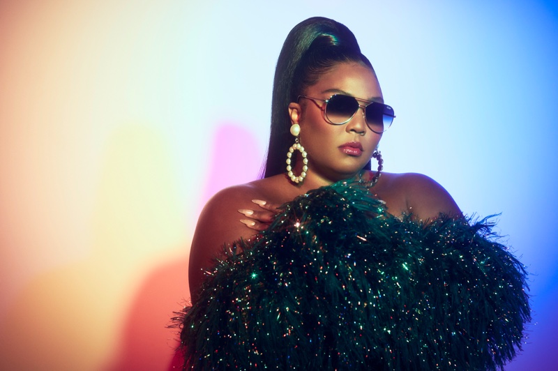 Lizzo poses in Quay Australia Hold Please sunglasses.