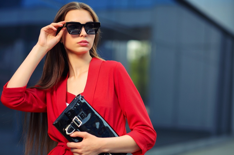 Model Red Suit Jacket Sunglasses Black Bag