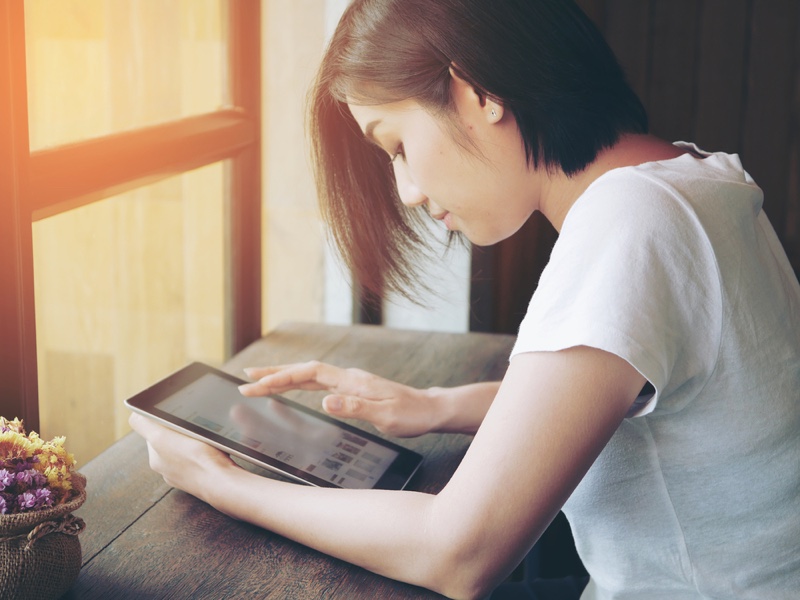 Woman Asian Looking Tablet Window Table