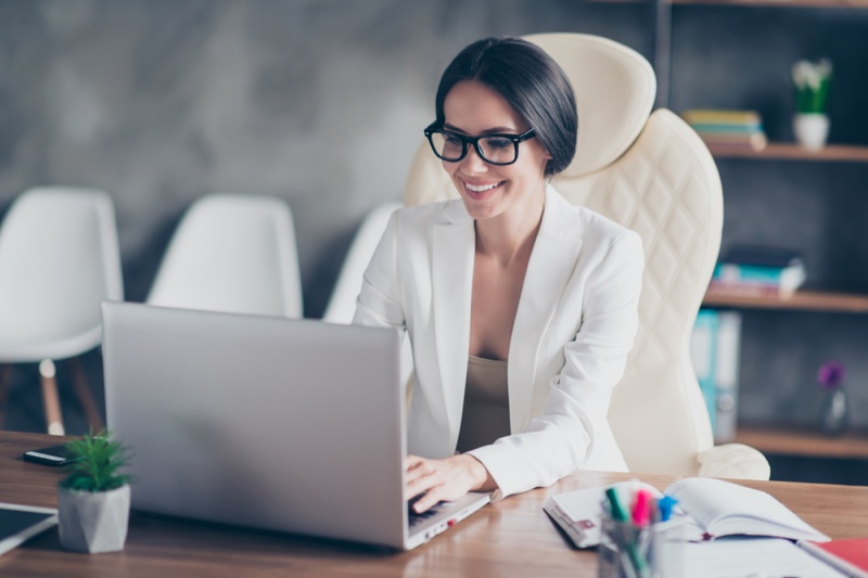 Woman Smiling Desk Laptop Glasses Professional