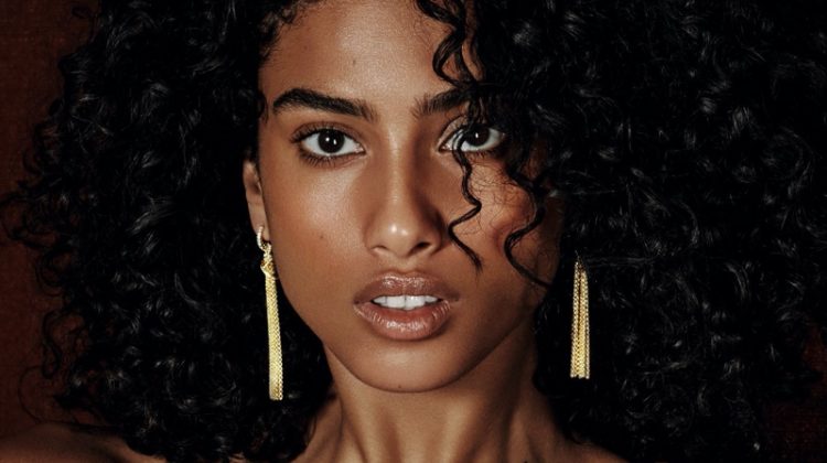 Imaan Hammam shines in gold David Yurman jewelry for Holt Renfrew.