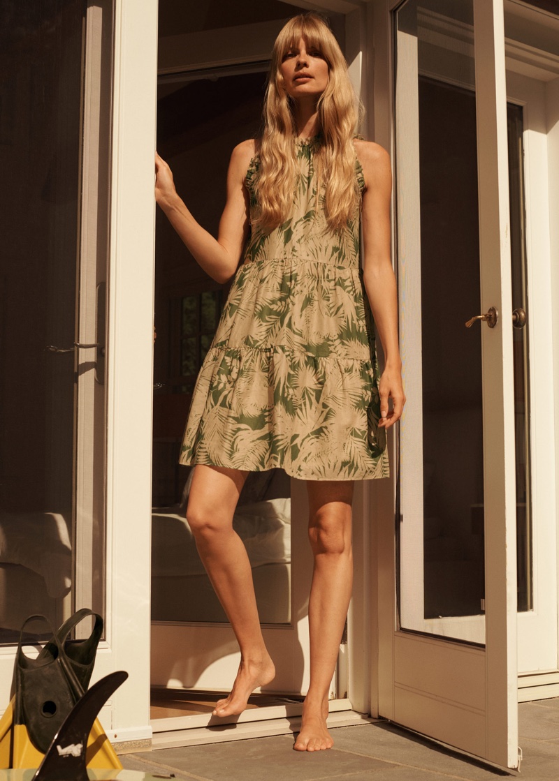 Model Julia Stegner wears Mango tropical print dress.
