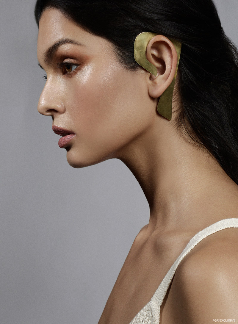 B Dodi ear cuff and Kordal Studio cream knit dress. Photo: Willis Roberts