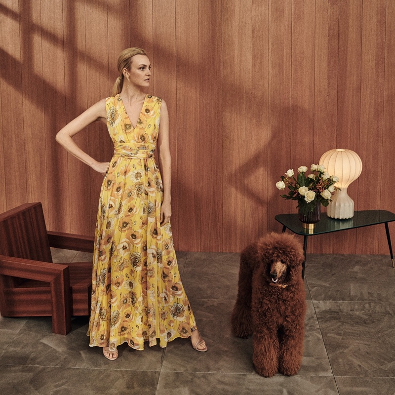 Model Caroline Trentini poses in a floral print gown from Max Mara.