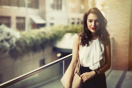 Things to Consider When Starting A Fashion Business Smiling Woman Professional Look Bag