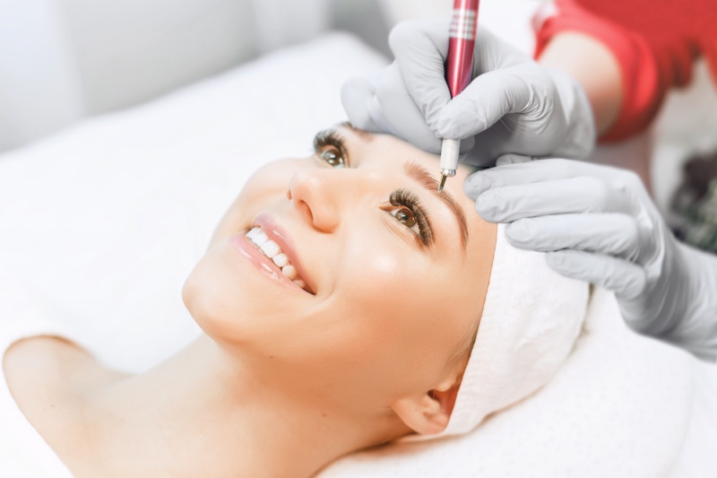 Woman Smiling While Microblading