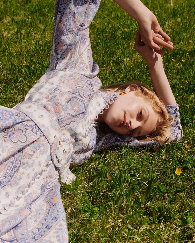 Eliza Kallmann poses in Zimmermann x MyTheresa paisley print dress.