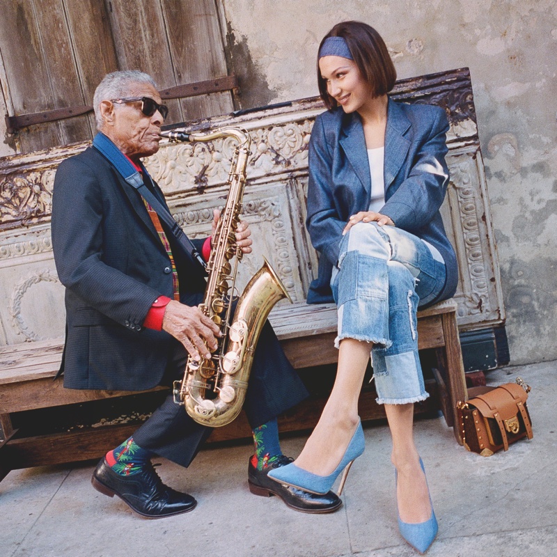 Taking in the music scene, Bella Hadid poses for MICHAEL Michael Kors Travel Diaries.