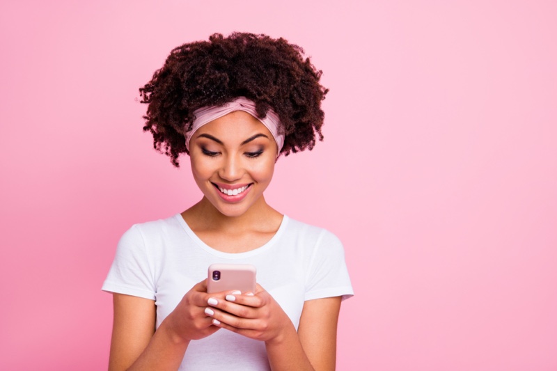 Black Model Afro Smiling Looking Phone