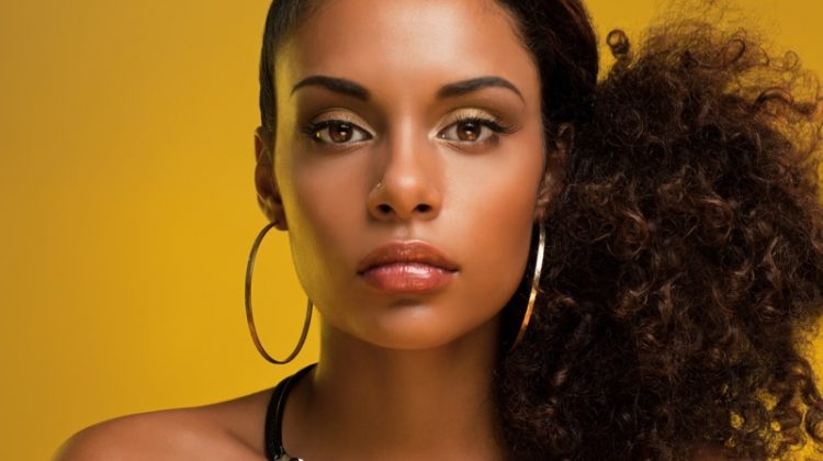 Has Gold Jewelry Been on Your Mind Lately? 7 Reasons It Should Be Black Model Gold Necklace Hoop Earrings