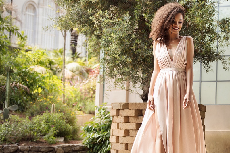 Black Model Outdoors Pink Pleated Dress Smiling