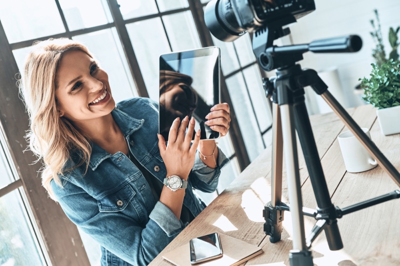 Blonde Woman Smiling Tablet Camera Influencer Setup