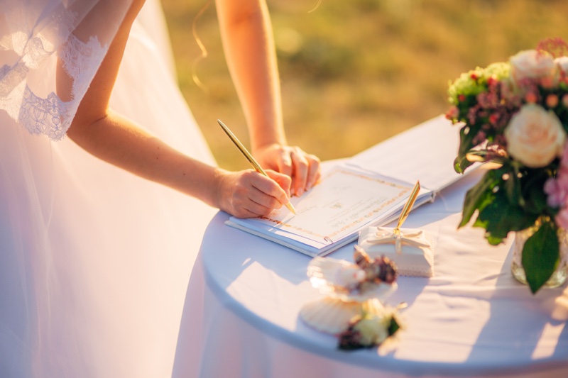 Bride Writing Wedding Registry