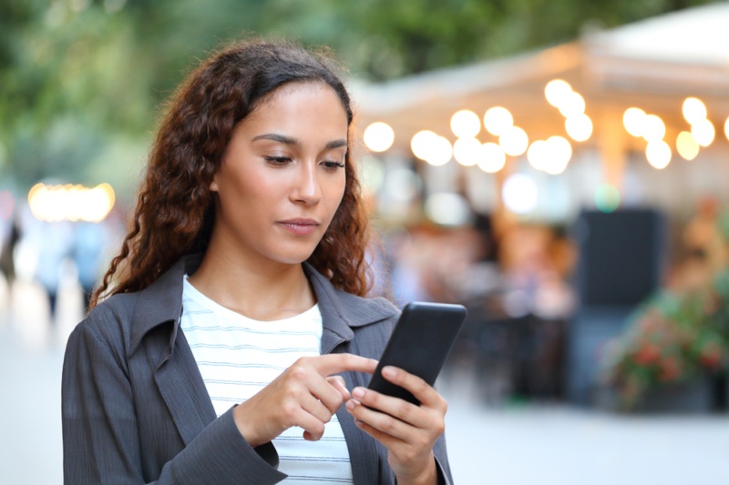 Brunette Woman Using Phone