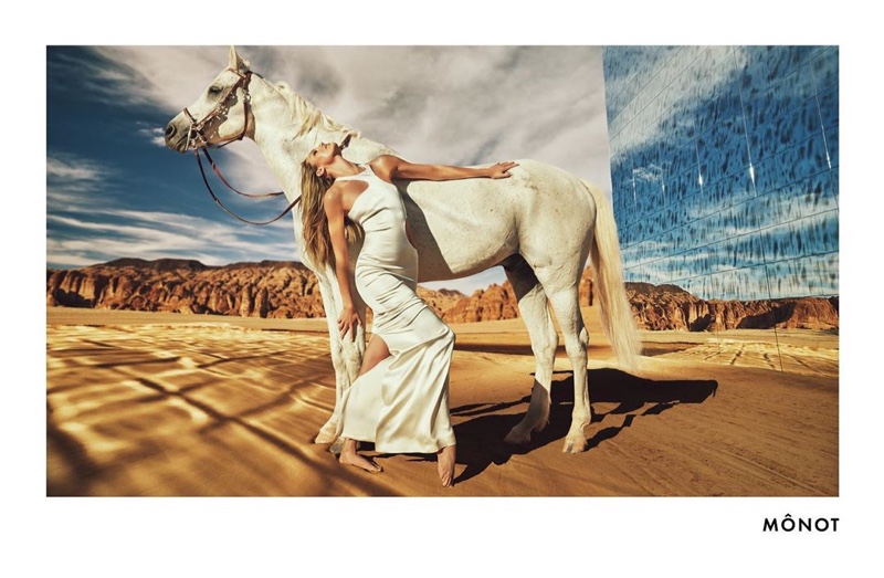 Candice Swanepoel poses with a horse in Mônot fall-winter 2020 campaign.