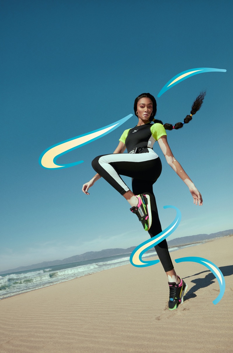 Taking a leap, Winnie Harlow poses for PUMA Mile Rider sneaker campaign.