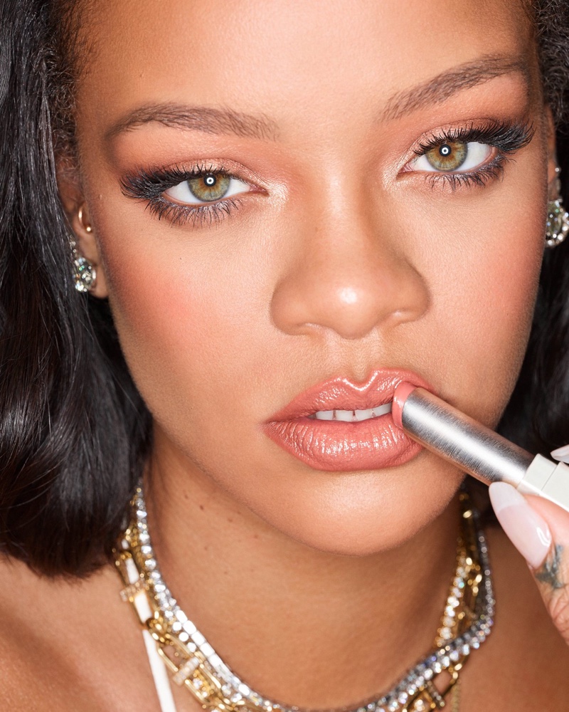 Rihanna stars in Fenty Beauty SLIP SHINE Sheer Shiny Lipstick campaign.