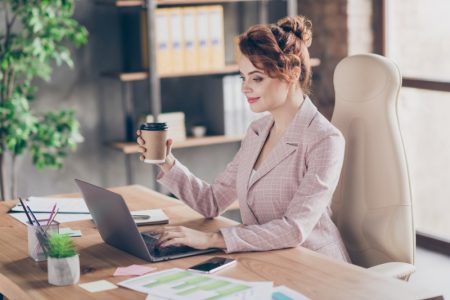 Dressing to Impress Over Zoom: Our Top Tips Well Dressed Woman Blazer Coffee Laptop