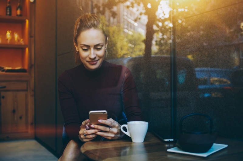 Window Woman Reading Cell Phone Cup